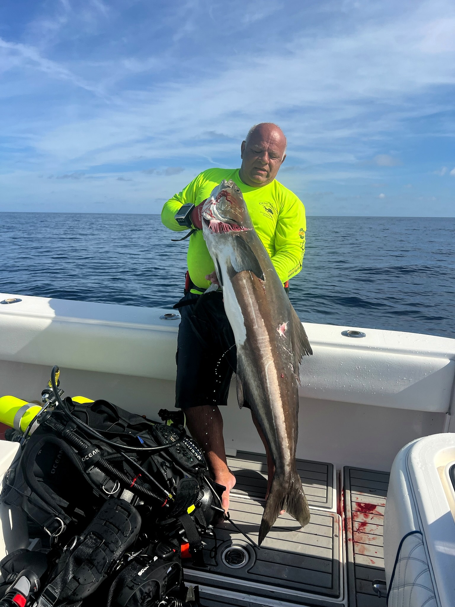 A fish coming aboard over the transom