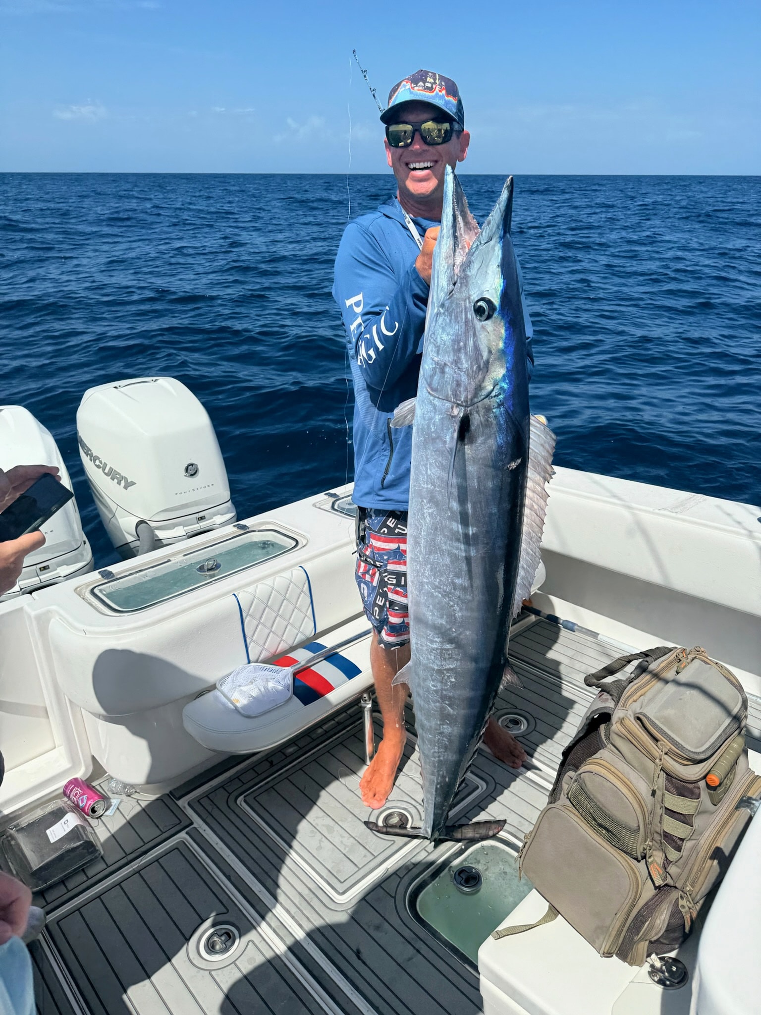 A wahoo held up boatside